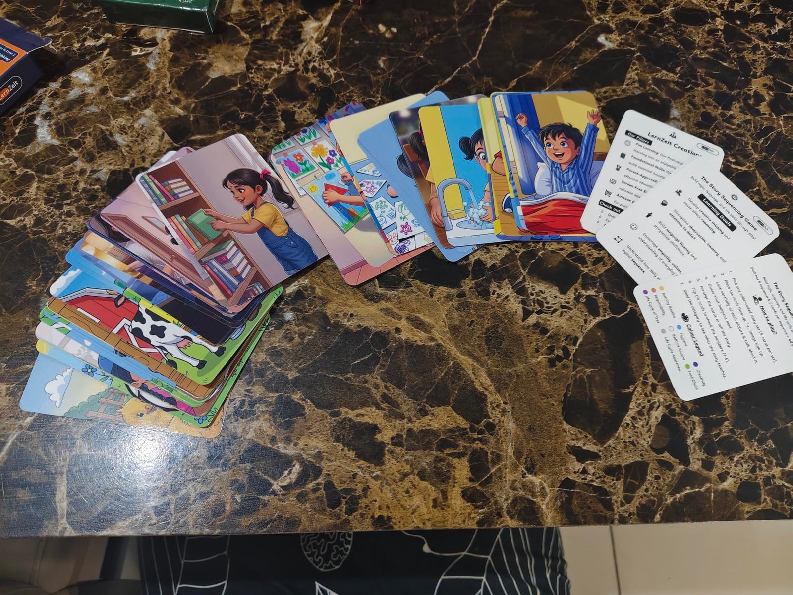 Parent and child playing with LernZeit flashcards